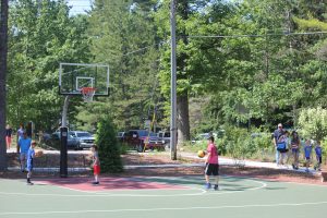 kids playing on basketball courts